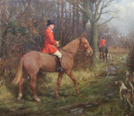 § George Denholm Armour (1864-1949) Huntsman and hounds at the edge of a wood 25 x 30in.